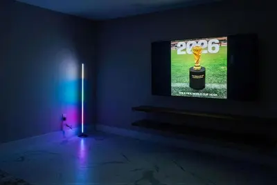 a room with a television with a trophy on it at 4BR5BA Luxury World Cup hub in North Bergen