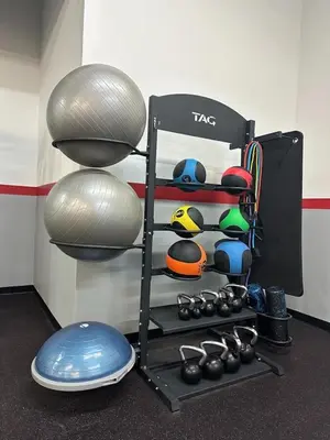 a rack with balls and other items on it at 4-Bedroom Furnished Apartment at Temple Crossing in Philadelphia