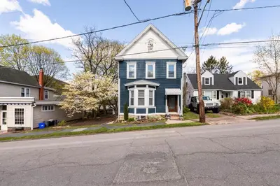 a blue house on the corner of a street at Jim Thorpe Center House - Families and Groups Welcome - Walkable in Jim Thorpe