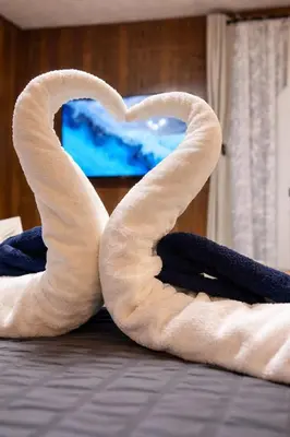 a pair of towels in the shape of a heart at 3BR home in Jersey city ! near metlife & NYC train in Jersey City