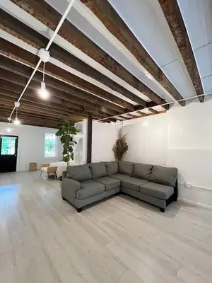 a large living room with a couch in a large room at Relaxing Stay Sleeps 4 & 2 Parking in Phoenixville