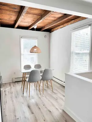 a dining room with a table and four chairs at Retreat with Parking Sleeps 6 in Phoenixville