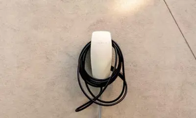 a nintendo wii controller sitting on the floor at Eclectic Artisan Loft With Pvt Parking - The Luminaire in Philadelphia