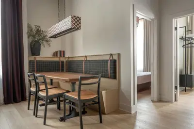 a dining room with a table and chairs at Luxurious Artisan Loft w Chic Design - The Tanner in Philadelphia