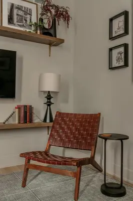 a bench in a room with a table and a lamp at Exquisite Artisan Loft w Chic Design - The Cobbler in Philadelphia