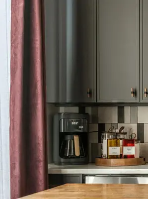 a kitchen with a coffee maker and a microwave at Exquisite Artisan Loft w Chic Design - The Cobbler in Philadelphia
