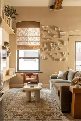a living room with a couch and a table at Chic Artisan Loft w Stylish Design - The Sculptor in Philadelphia