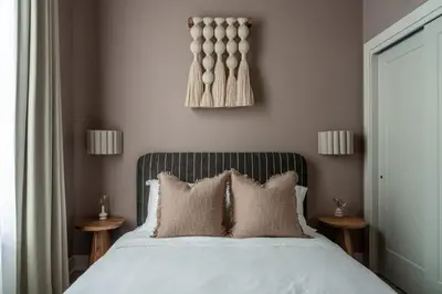 a bedroom with a bed with white sheets and pillows at Stylish Artisan Loft w Chic Design - The Potter in Philadelphia