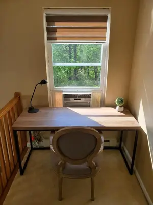 a desk with a lamp and a chair in front of a window at GreatEscape Nature Playground HiSpeedInternet in Long Pond