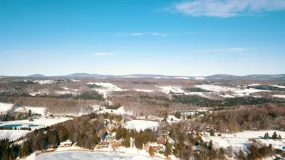 an aerial view of a ski resort in the snow at Holiday Inn Express & Suites Gibson by IHG in New Milford