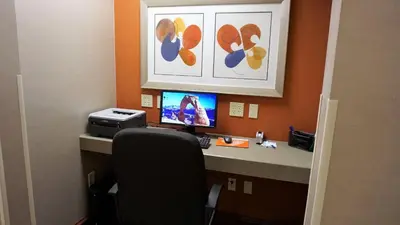 an office with a desk with a computer and a printer at Holiday Inn Express & Suites Gibson by IHG in New Milford