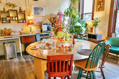 a kitchen with a table with fruit on it at Interfaith Retreats in New York