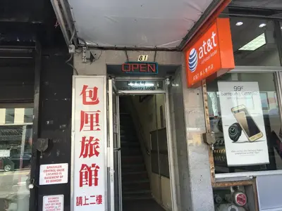 an open sign on the door of a store at Manhattan Bowery Lodge in New York