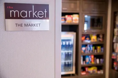 a sign for the market in a store with a refrigerator at Residence Inn by Marriott Philadelphia Great Valley/Malvern in Malvern