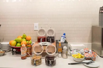 a kitchen counter with a bunch of food on it at Residence Inn by Marriott Philadelphia Great Valley/Malvern in Malvern