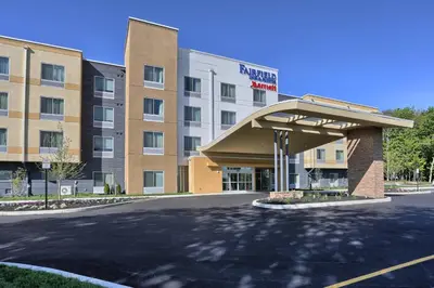 a hotel building with a parking lot in front of it at Fairfield by Marriott Inn & Suites Philadelphia Horsham in Willow Grove