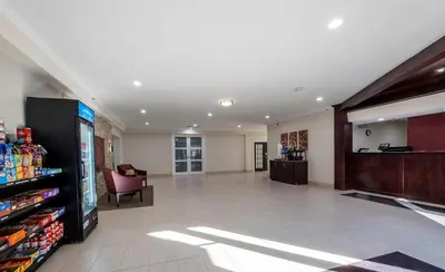 an empty lobby of a store with a drink at Red Roof Inn Bordentown - McGuire AFB in Bordentown