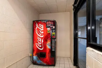 a coca cola vending machine in a room at Red Roof Inn Bordentown - McGuire AFB in Bordentown