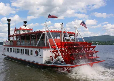 a red and white ferry boat in the water at Holiday Inn Express Hotel & Suites West Point-Fort Montgomery by IHG in Fort Montgomery