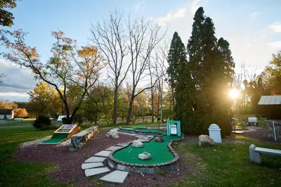 a miniature golf course with a putting green at Spring Gulch Cottage 1 in Mount Airy