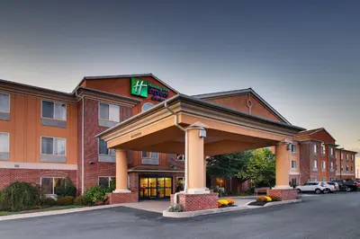 a hotel with a sign on the front of a building at Holiday Inn Express Hotel & Suites Lancaster-Lititz by IHG in Lititz