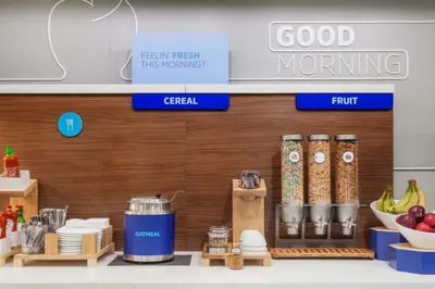 a grocery store with food items on a shelf at Holiday Inn Express Hotel & Suites Lancaster-Lititz by IHG in Lititz