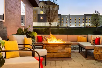 a patio with couches and a fire pit at Home2 Suites By Hilton York in York