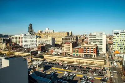 an aerial view of a city with buildings and cars at Four Points Philadelphia City Center in Philadelphia