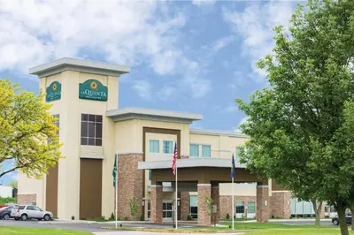 a building with a car parked in front of it at La Quinta by Wyndham York in York