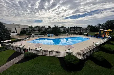 an overhead view of a swimming pool at a resort at Red Lion Hotel Harrisburg Hershey in Harrisburg