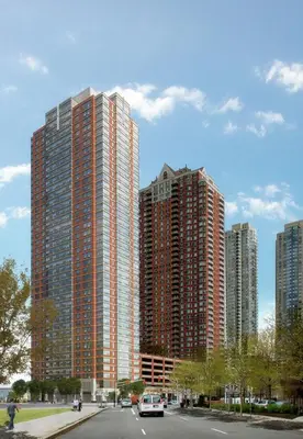 a city with tall buildings and cars on a street at Global Luxury Suites at Newport in Jersey City