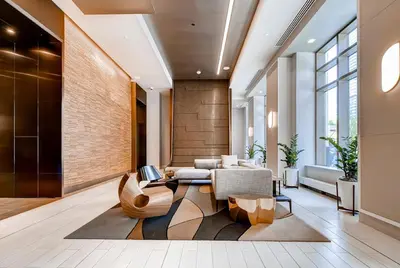 a living room with a couch and a table at Global Luxury Suites at Newport in Jersey City