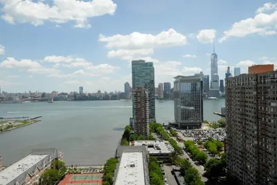 a view of the chicago river and the city at Global Luxury Suites at Newport in Jersey City