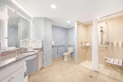 a bathroom with a sink and a toilet and a shower at Homewood Suites by Hilton East Rutherford - Meadowlands, NJ in East Rutherford