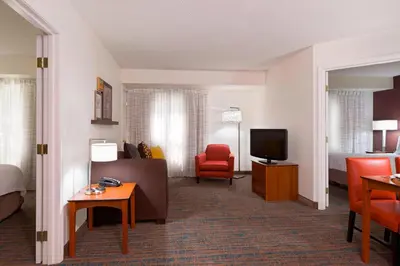 a hotel room with a bed and a television at Residence Inn by Marriott Philadelphia Montgomeryville in North Wales
