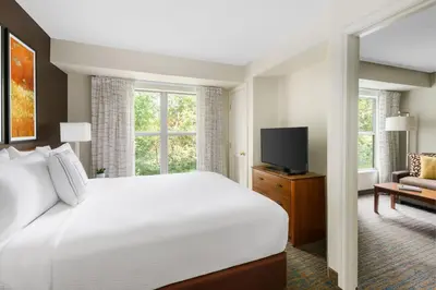 a hotel room with a bed and a television at Residence Inn by Marriott Philadelphia Montgomeryville in North Wales