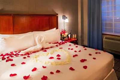 a bed with a heart made out of roses at Four Points by Sheraton Midtown - Times Square in New York