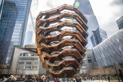 a tall building in the middle of a city at Four Points by Sheraton Midtown - Times Square in New York