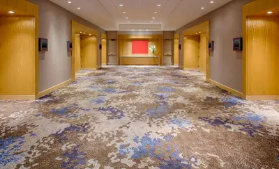 an empty hallway with a damaged floor in a building at Hyatt Regency Jersey City on the Hudson in Jersey City