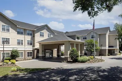 a rendering of the front of a hotel at Homewood Suites by Hilton Newark-Cranford in Cranford