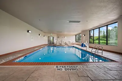 a large swimming pool in a house at Hampton Inn Ridgefield Park in Ridgefield Park