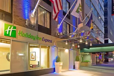 a building with a houston firmexpress sign on it at Holiday Inn Express - Wall Street by IHG in New York