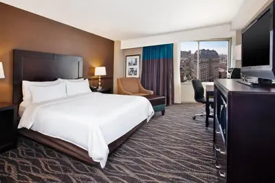 a hotel room with a large bed and a desk at Holiday Inn Express Philadelphia-Midtown by IHG in Philadelphia
