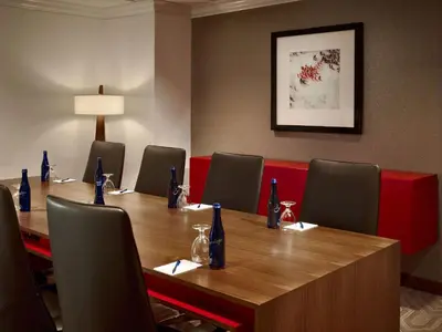 a conference room with a long wooden table and chairs at Sonesta Philadelphia Rittenhouse Square in Philadelphia