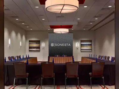 a conference room with a long table and chairs at Sonesta Philadelphia Rittenhouse Square in Philadelphia