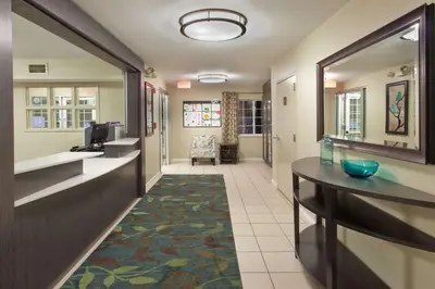 a corridor of a hospital room with a hallway at Sonesta Simply Suites Nanuet in Nanuet