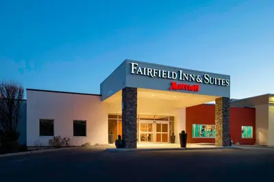 a building with a sign that reads certified living and suites at Fairfield Inn & Suites by Marriott Paramus in Paramus