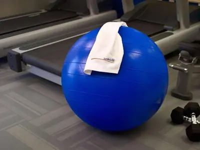 a blue gym ball with a towel on it at Sonesta ES Suites Somerset in Somerset