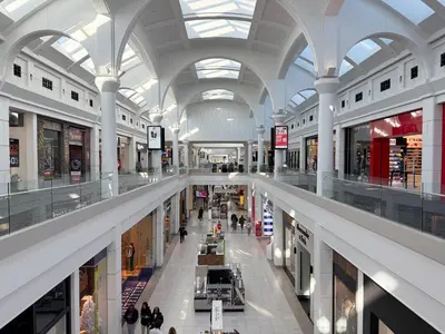 a large shopping mall with people walking through it at Holiday Inn South Plainfield-Piscataway by IHG in South Plainfield