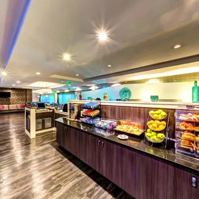 a buffet line in a restaurant with food on display at Holiday Inn Princeton by IHG in Princeton